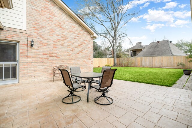 12215 Clearfork Dr, Houston, TX 77077 - view of patio featuring outdoor dining area