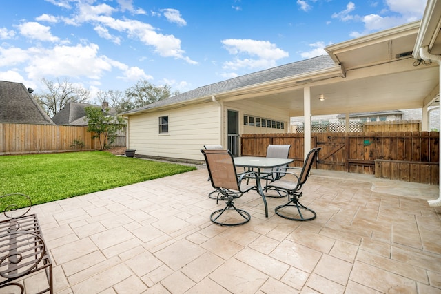 view of patio / terrace featuring outdoor dining area and a fenced backyard