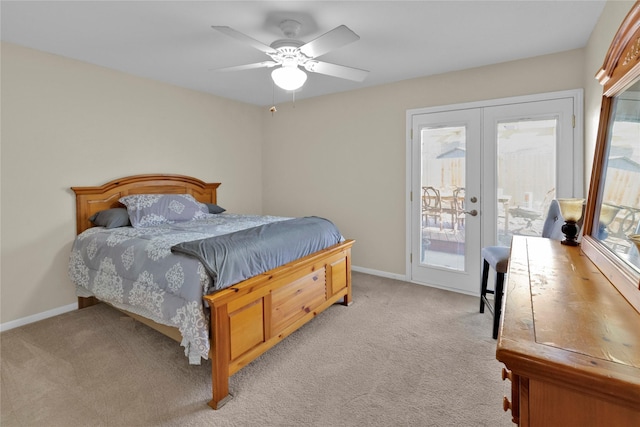 bedroom featuring light carpet, french doors, baseboards, and access to exterior