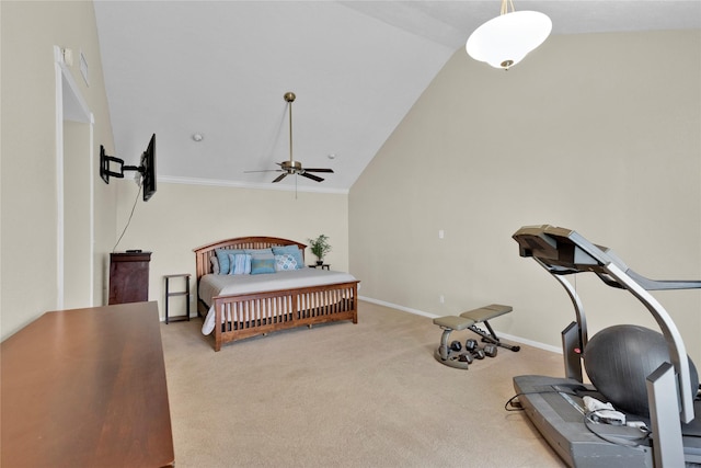 bedroom with lofted ceiling, carpet, and baseboards