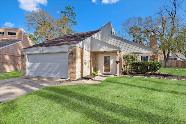 view of front of home with driveway, brick siding, a front lawn, and an attached garage