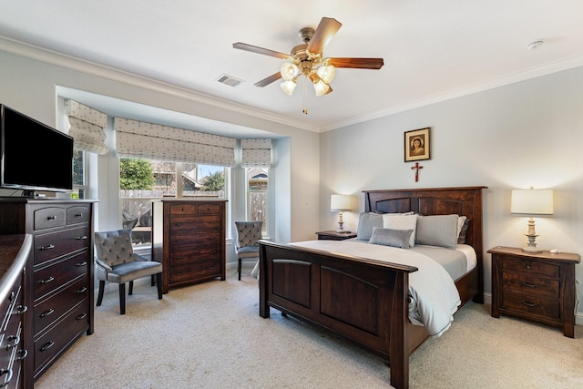 bedroom featuring light carpet, ceiling fan, visible vents, and crown molding