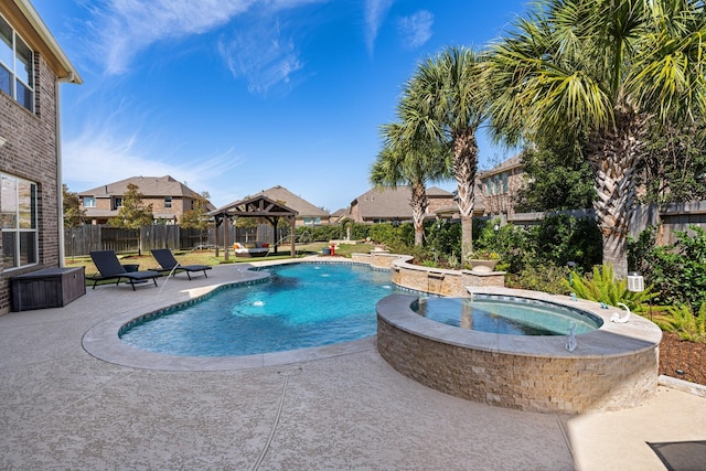 view of pool with a gazebo, a patio area, a fenced backyard, and a fenced in pool