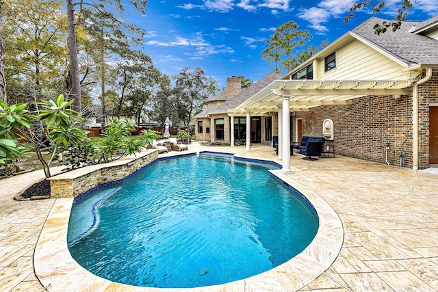 view of pool featuring a patio, a fenced in pool, and a pergola