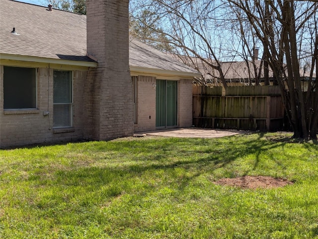 view of yard with a patio area and fence