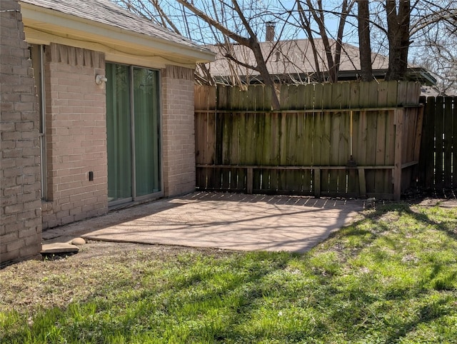 view of patio / terrace with fence