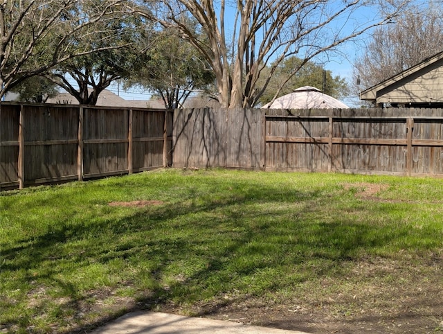 view of yard featuring fence