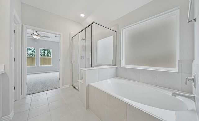 19738 Chianti Point Dr, Hockley, TX 77447 - bathroom featuring a garden tub, ceiling fan, a shower stall, and tile patterned flooring