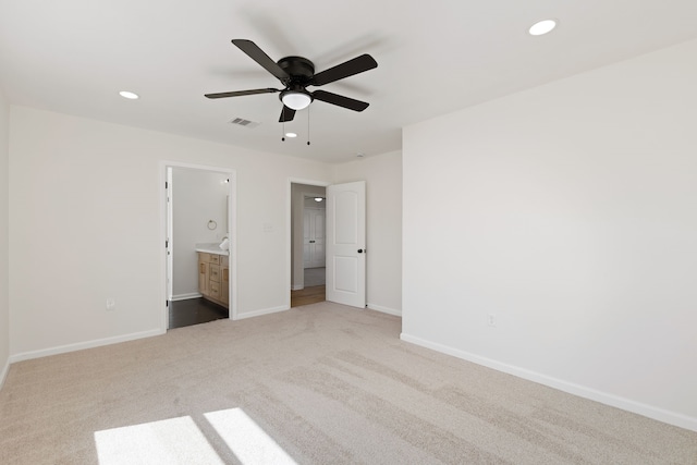 unfurnished bedroom with visible vents, carpet flooring, recessed lighting, and baseboards