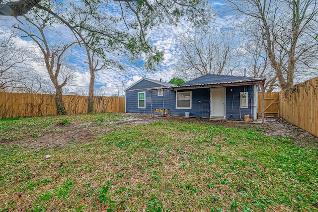 view of front of house featuring a fenced backyard