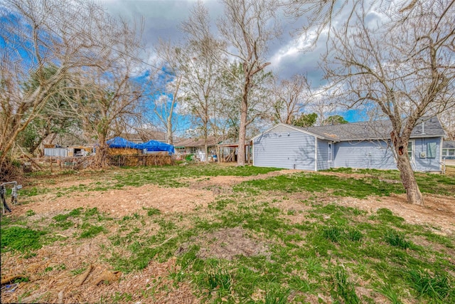 view of yard featuring fence