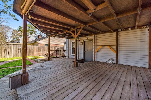 wooden deck featuring fence