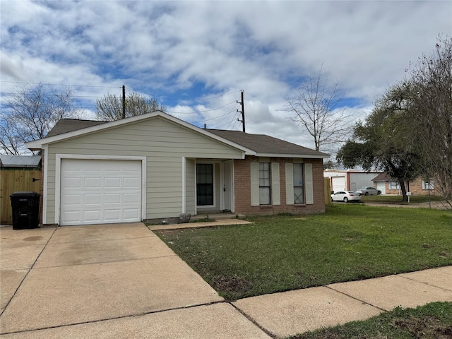 view of front of home with driveway, a shingled roof, an attached garage, a front yard, and brick siding