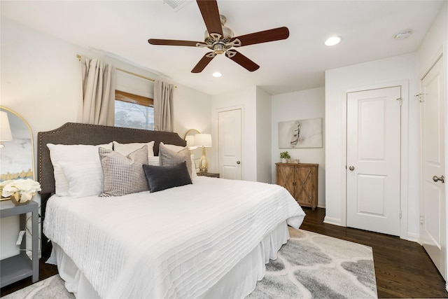 bedroom with recessed lighting, dark wood-style floors, and a ceiling fan