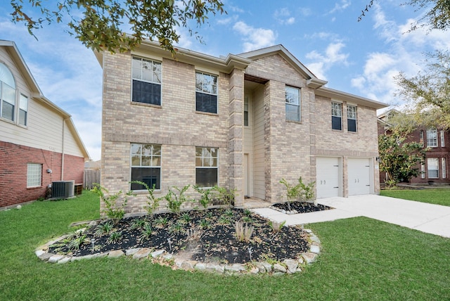 traditional-style house featuring brick siding, driveway, central AC, and a front lawn