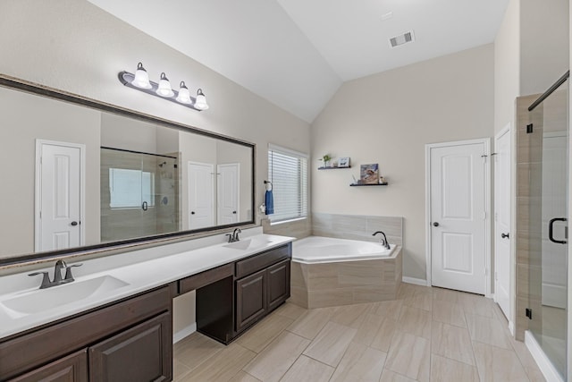 full bathroom with a sink, visible vents, a stall shower, and a bath