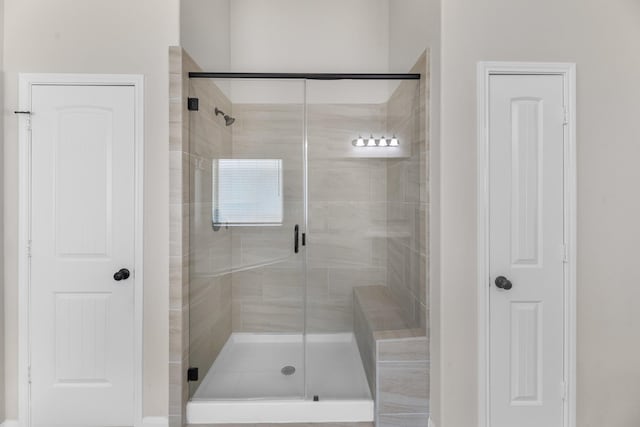 full bathroom with a shower stall