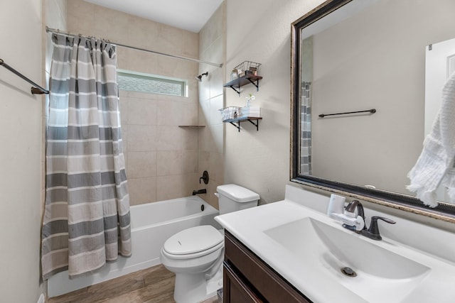 full bathroom with vanity, toilet, shower / bath combo, and wood finished floors