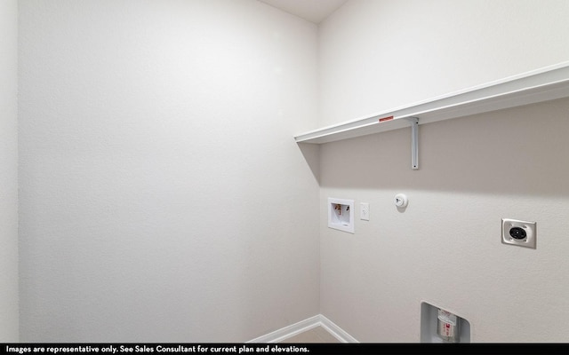 laundry area featuring electric dryer hookup, washer hookup, hookup for a gas dryer, baseboards, and laundry area