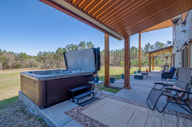 view of patio with a hot tub