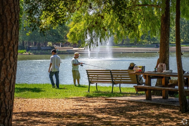 view of property's community with a water view