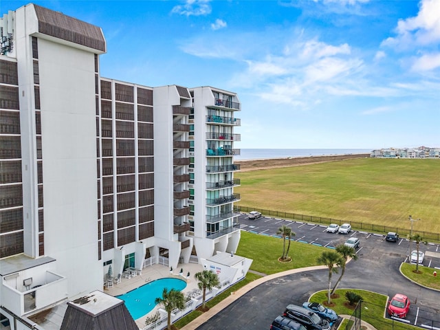 view of building exterior with a water view