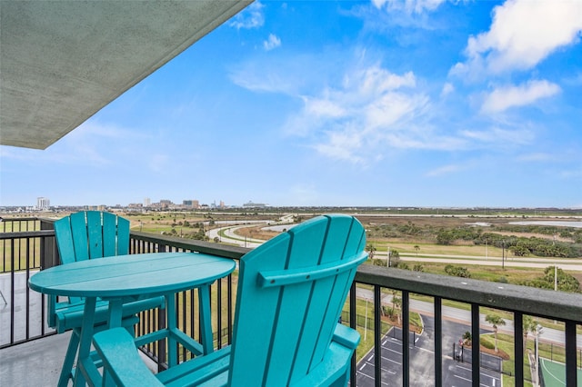 balcony featuring a city view