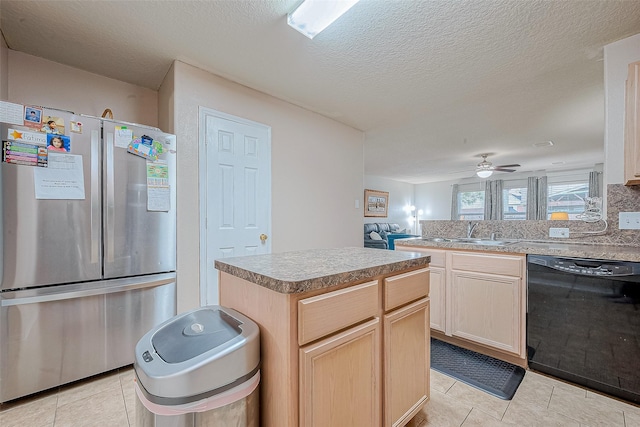 kitchen with a ceiling fan, light brown cabinets, black dishwasher, freestanding refrigerator, and light tile patterned flooring