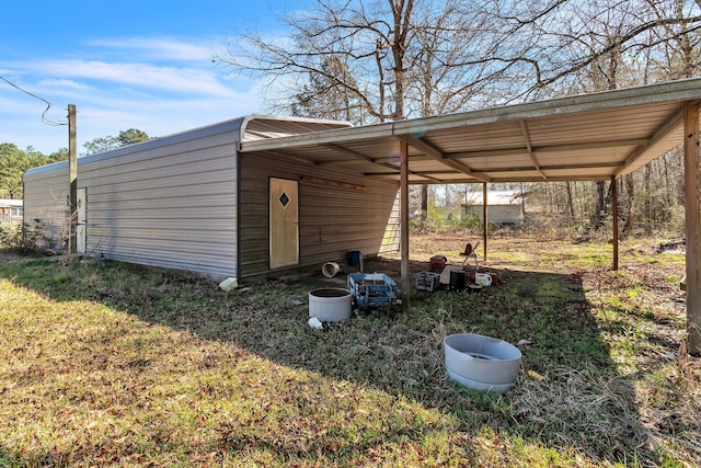 exterior space featuring a carport