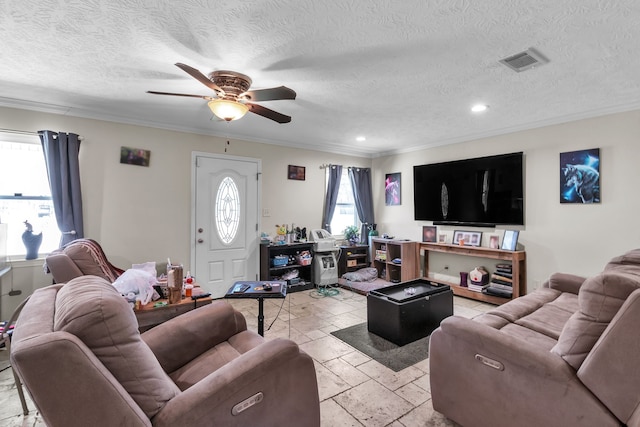 living area featuring visible vents, ornamental molding, stone tile flooring, recessed lighting, and ceiling fan