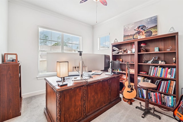 office with ceiling fan, baseboards, light carpet, and ornamental molding