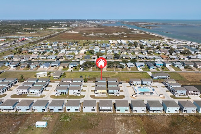 birds eye view of property with a residential view