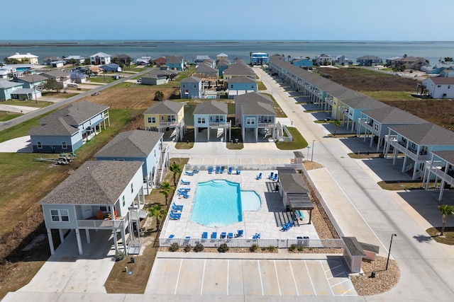 aerial view featuring a residential view and a water view