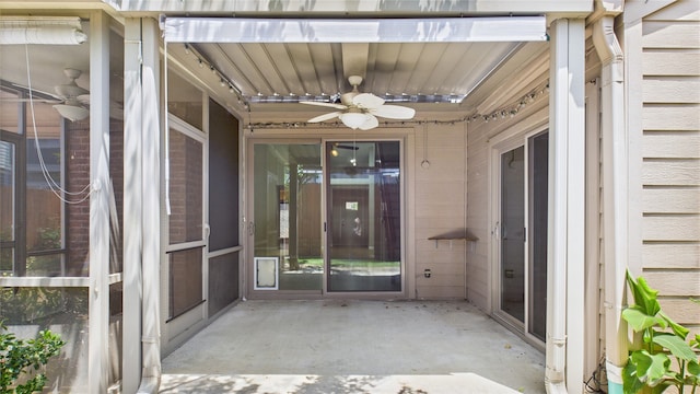 2026 Ashford Hollow Ln, Houston, TX 77077 - view of exterior entry with ceiling fan and a patio area