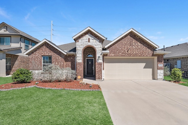 view of front of house with brick siding, concrete driveway, a front yard, stone siding, and an attached garage