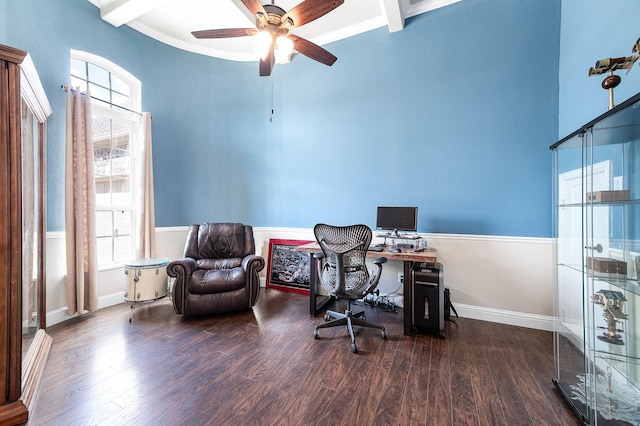 office area with a ceiling fan, beamed ceiling, wood finished floors, and baseboards