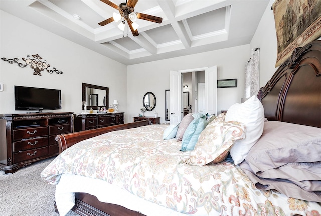 bedroom with a ceiling fan, beam ceiling, carpet, and coffered ceiling