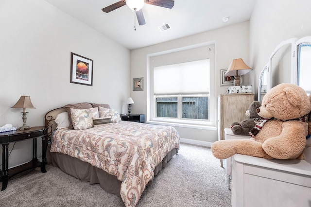 bedroom with visible vents, a ceiling fan, baseboards, and carpet floors