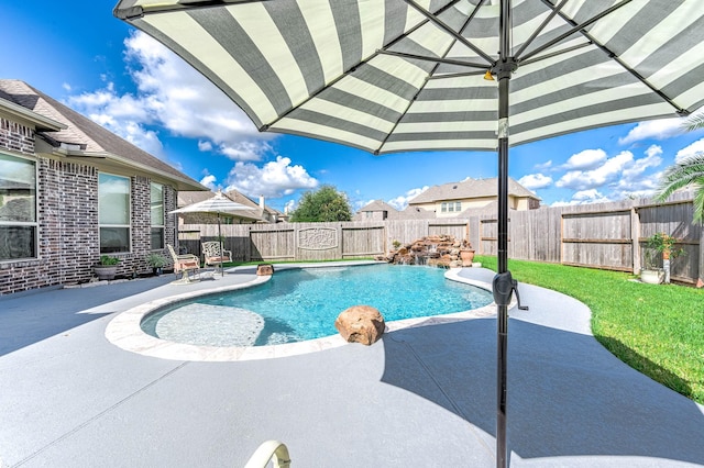 view of pool with a patio area, a fenced in pool, a lawn, and a fenced backyard