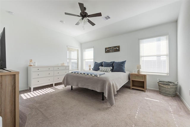 bedroom featuring visible vents, baseboards, carpet, lofted ceiling, and ceiling fan