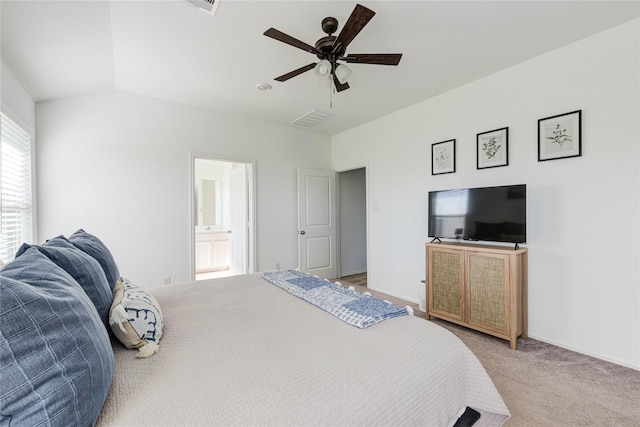 bedroom with visible vents, light carpet, a ceiling fan, connected bathroom, and baseboards