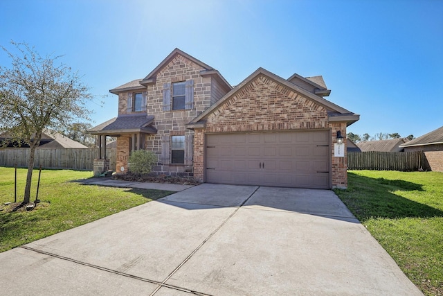 view of front of property with brick siding, a front lawn, fence, concrete driveway, and a garage