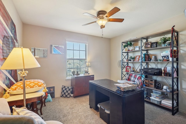 office area featuring carpet flooring and a ceiling fan