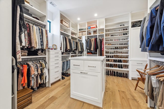 spacious closet with visible vents and light wood-type flooring