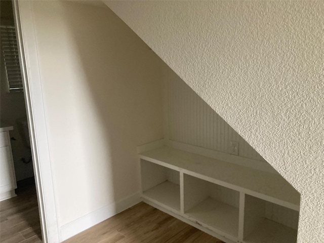 13109 Mundet Dr, Houston, TX 77047 - mudroom featuring wood finished floors and baseboards