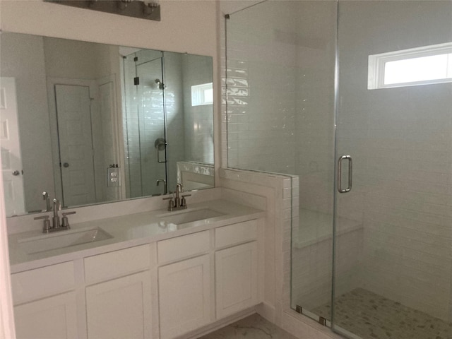 13109 Mundet Dr, Houston, TX 77047 - full bathroom featuring a shower stall and double vanity