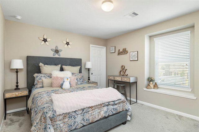 bedroom featuring carpet flooring, baseboards, and visible vents