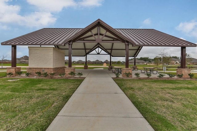 surrounding community featuring a gazebo and a yard