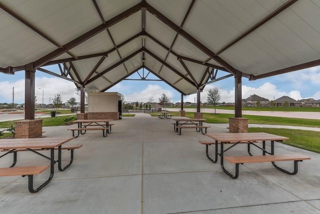 surrounding community featuring a yard and a patio area