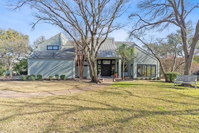 exterior space with a front yard